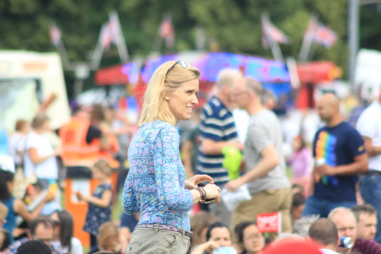 people in the street are enjoying an outdoor event