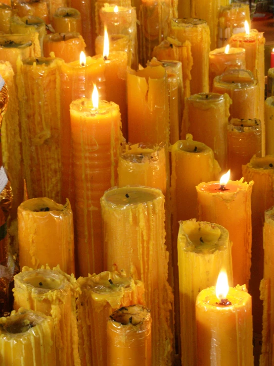 several candles and decorations are arranged for a po