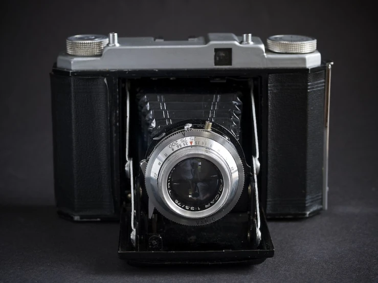 an old camera with no lens, pographed from the bottom