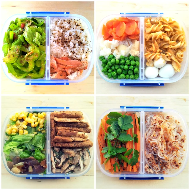 four different compartments in a plastic container filled with food