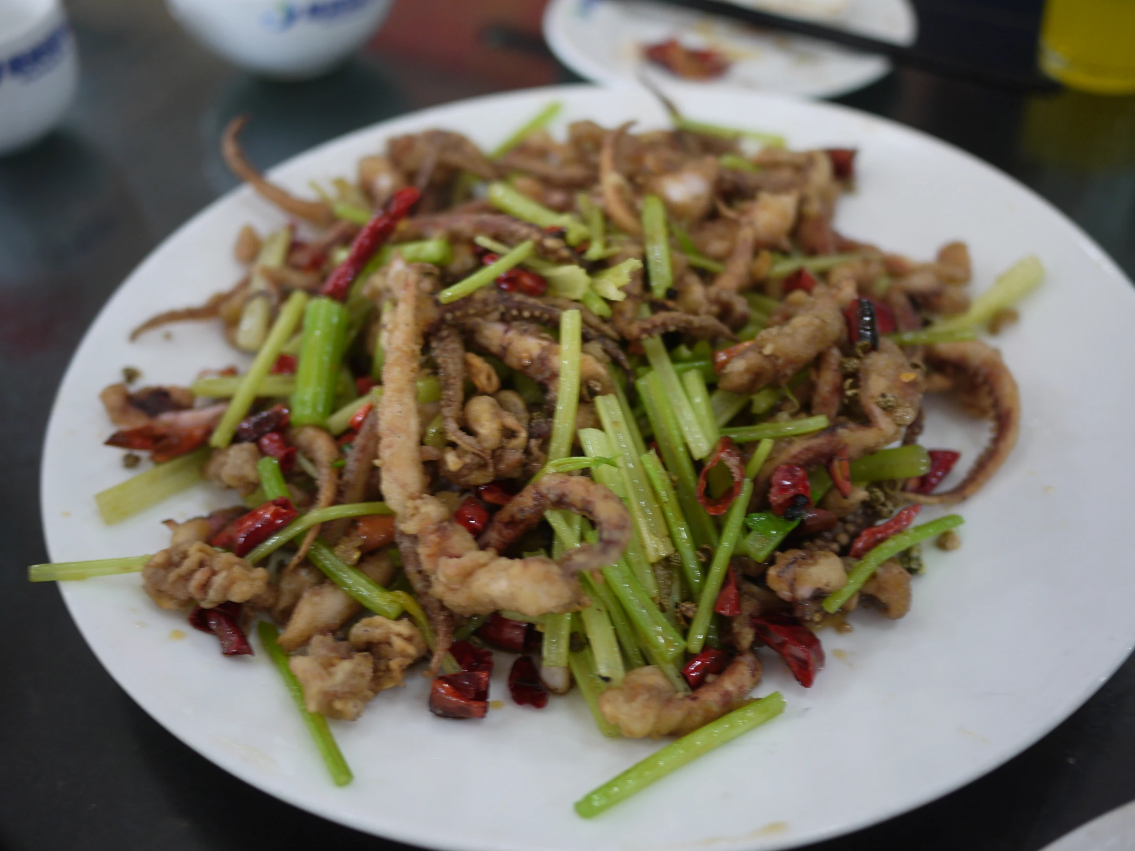 a close up of a plate of food with asparagus and meat