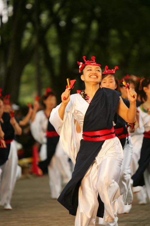 group of children perform a traditional dance during a ceremony