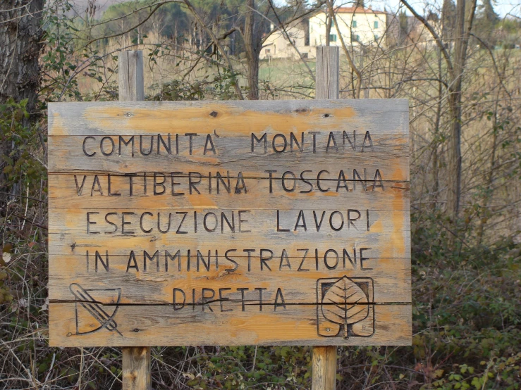 a sign indicating the direction to various towns