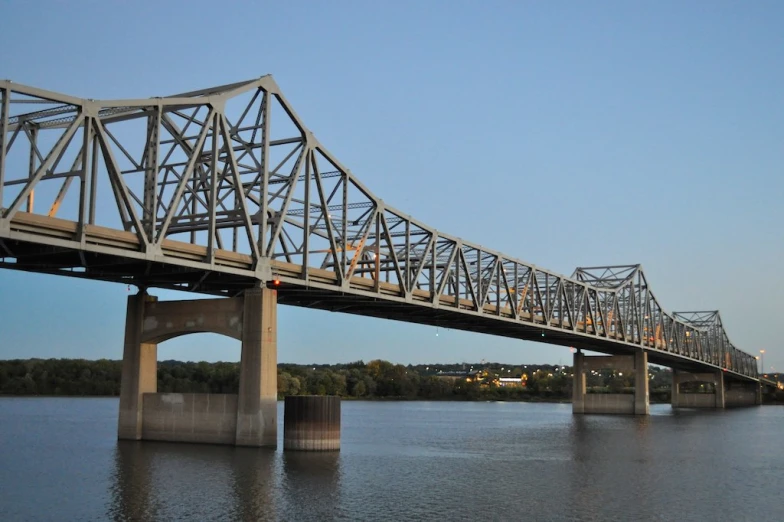 a steel bridge over a large body of water