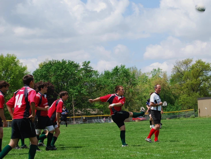 a man on a field with a soccer ball