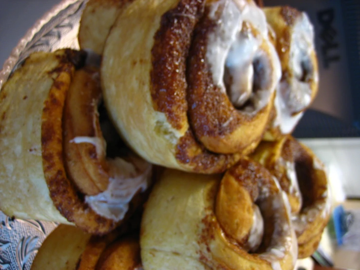 several pastry treats sitting in a glass dish