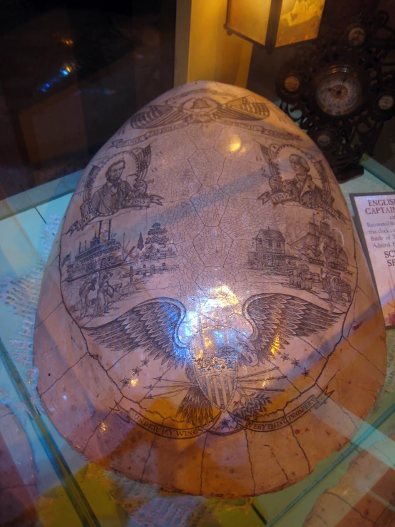 a large glass globe sitting on top of a desk