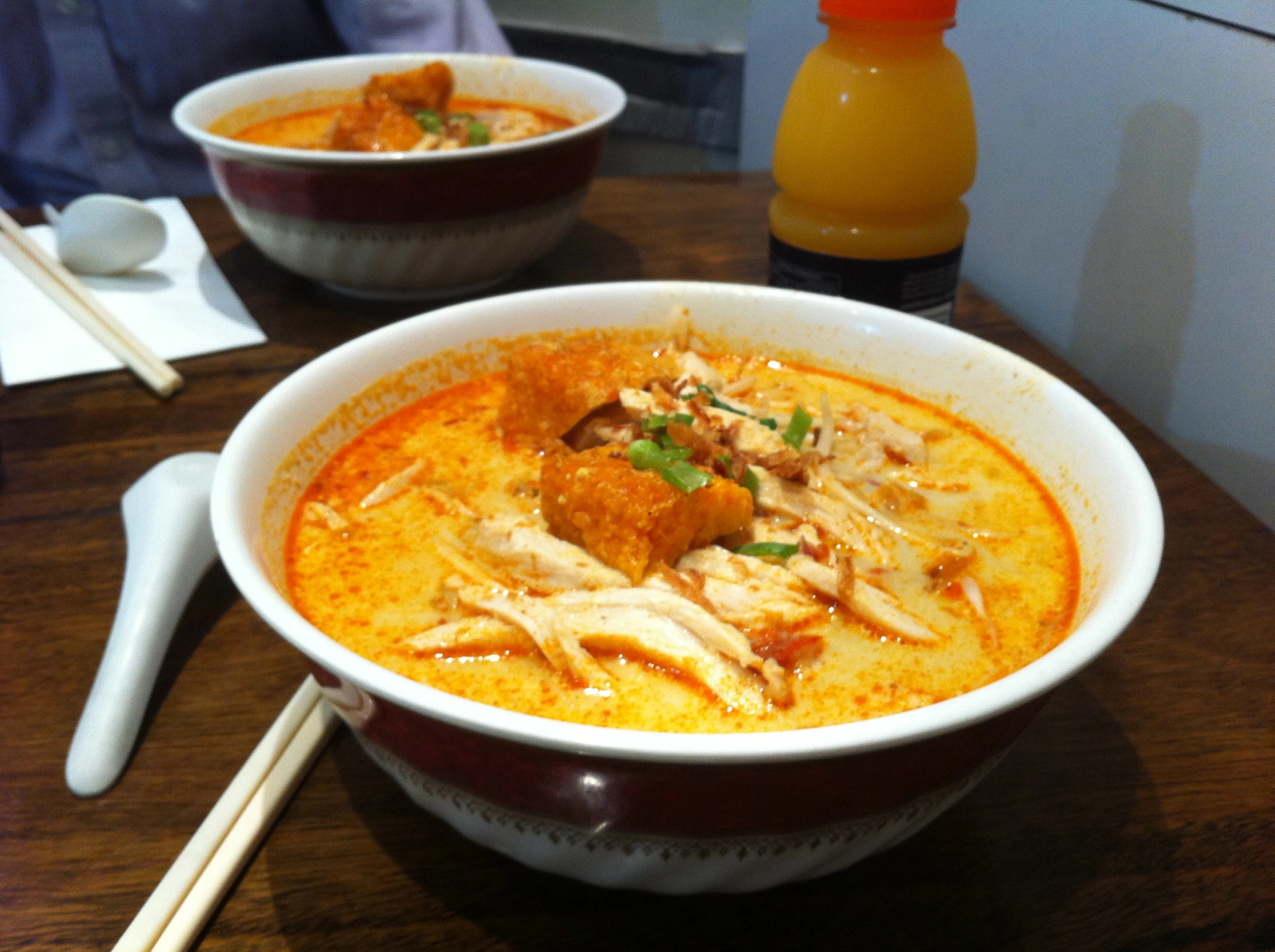 a close up of a bowl of food on a table