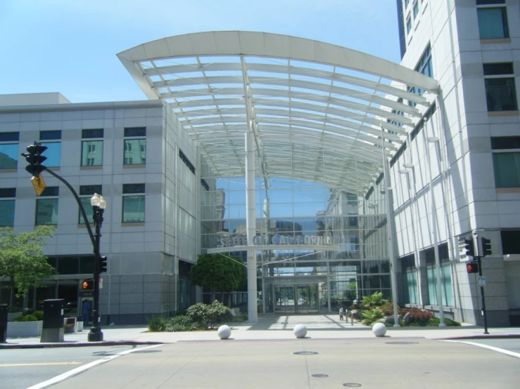 a city intersection in front of a large office building