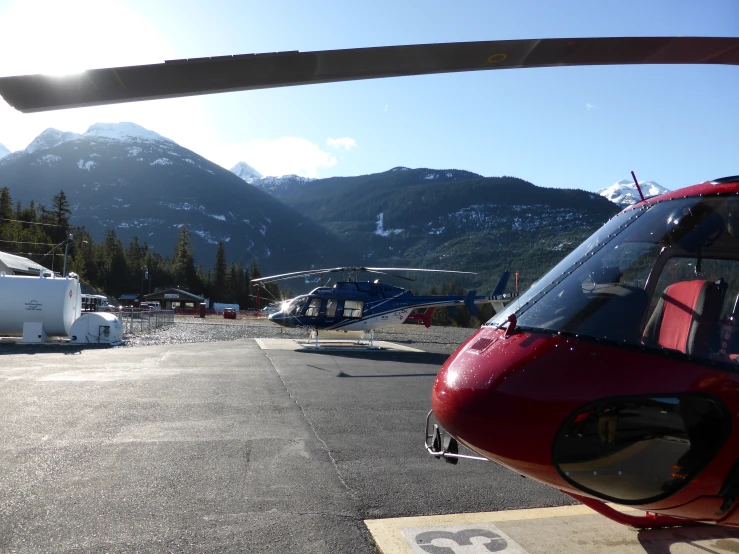 a helicopter is parked in a stationary position