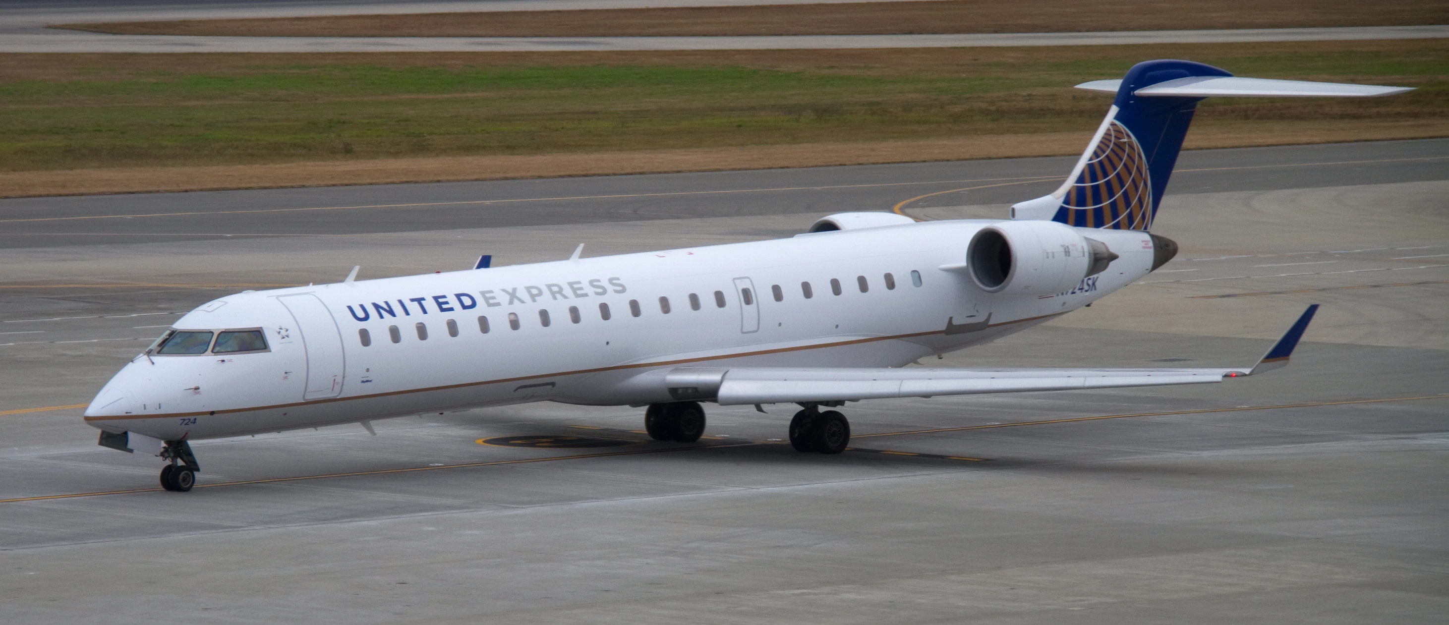 an united airlines plane is sitting in a stationary position