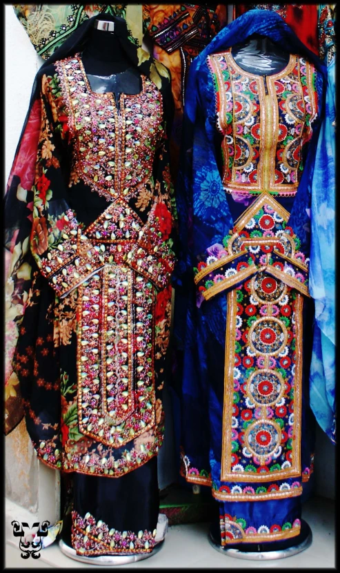 two dresses made from fabrics and fabric material