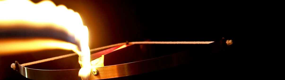 the incense is lit on an orange surface