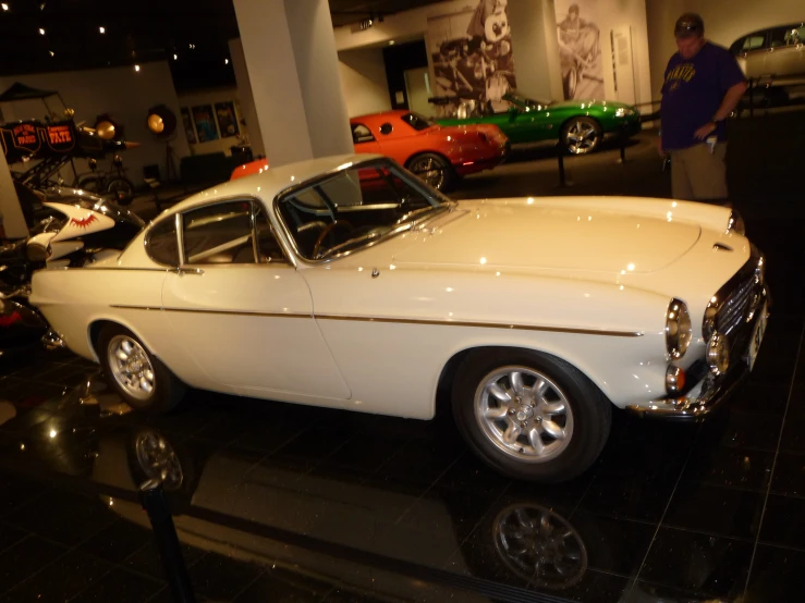 an old car on display in a museum