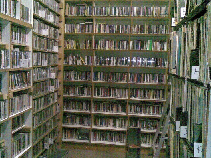 a large number of books lined up on shelves