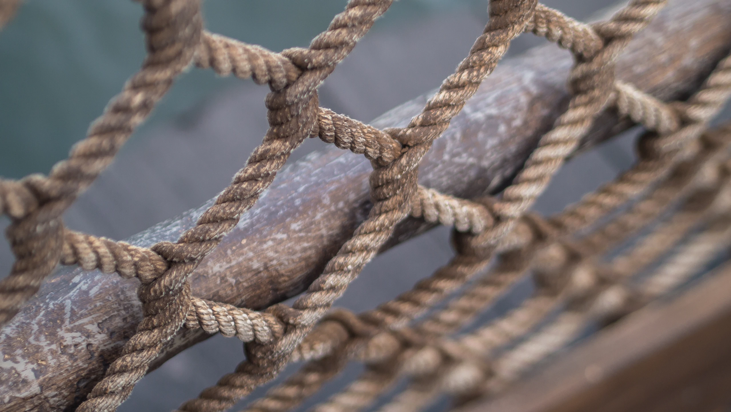 some rope attached to the top of a wooden structure