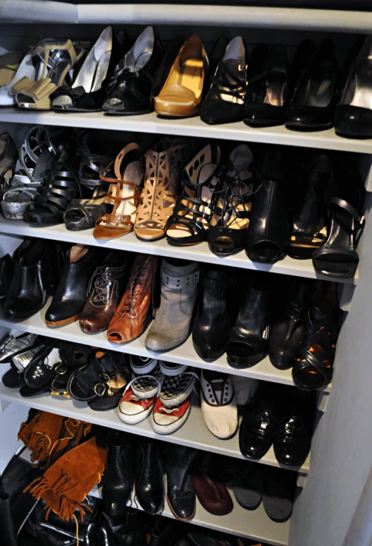 a shelf with shoes that are also on them