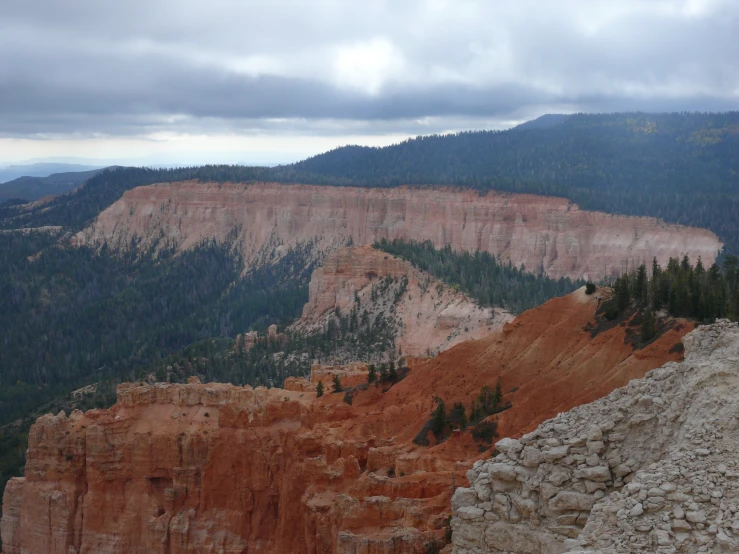 an image of a man on top of some mountains