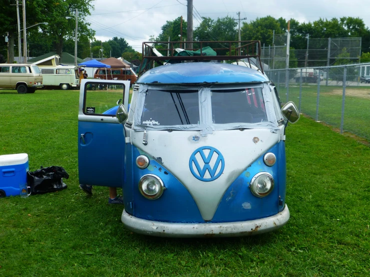 vw bus parked in an exhibit field
