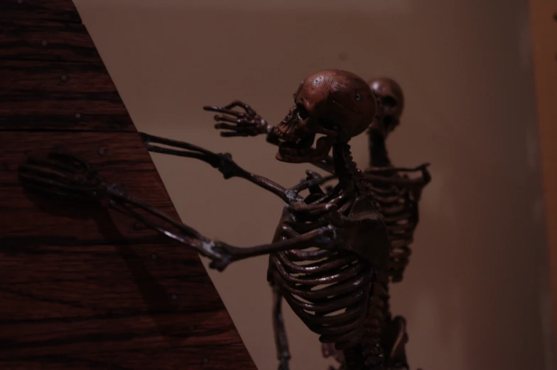 a skeleton figure that is on top of a table