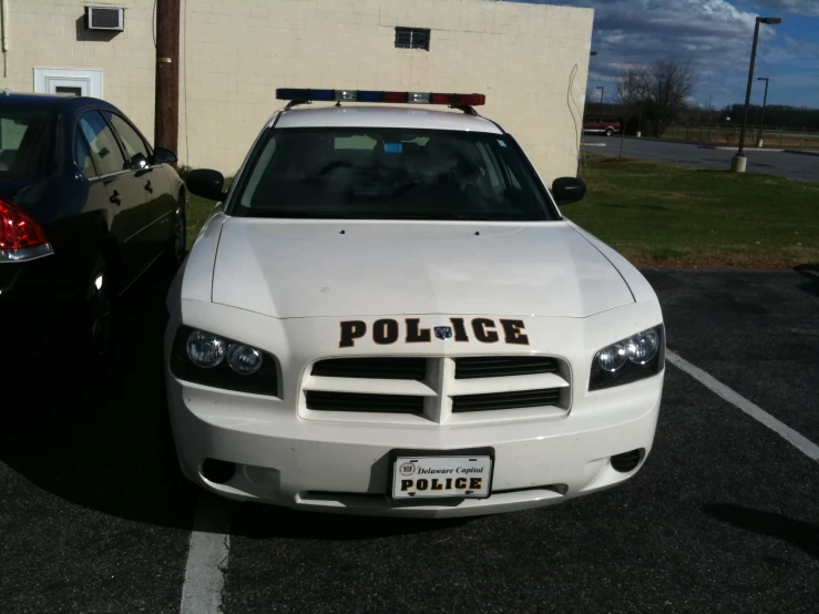the police vehicle is parked in the lot