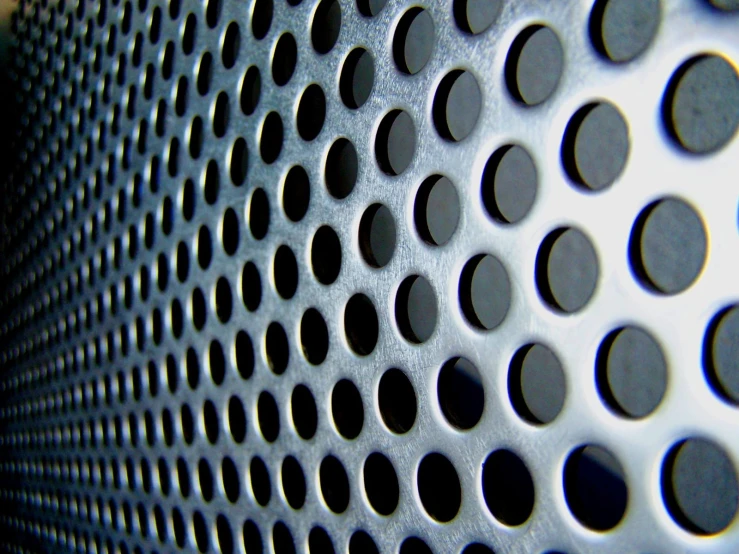 the texture of an electronic device with circles on it
