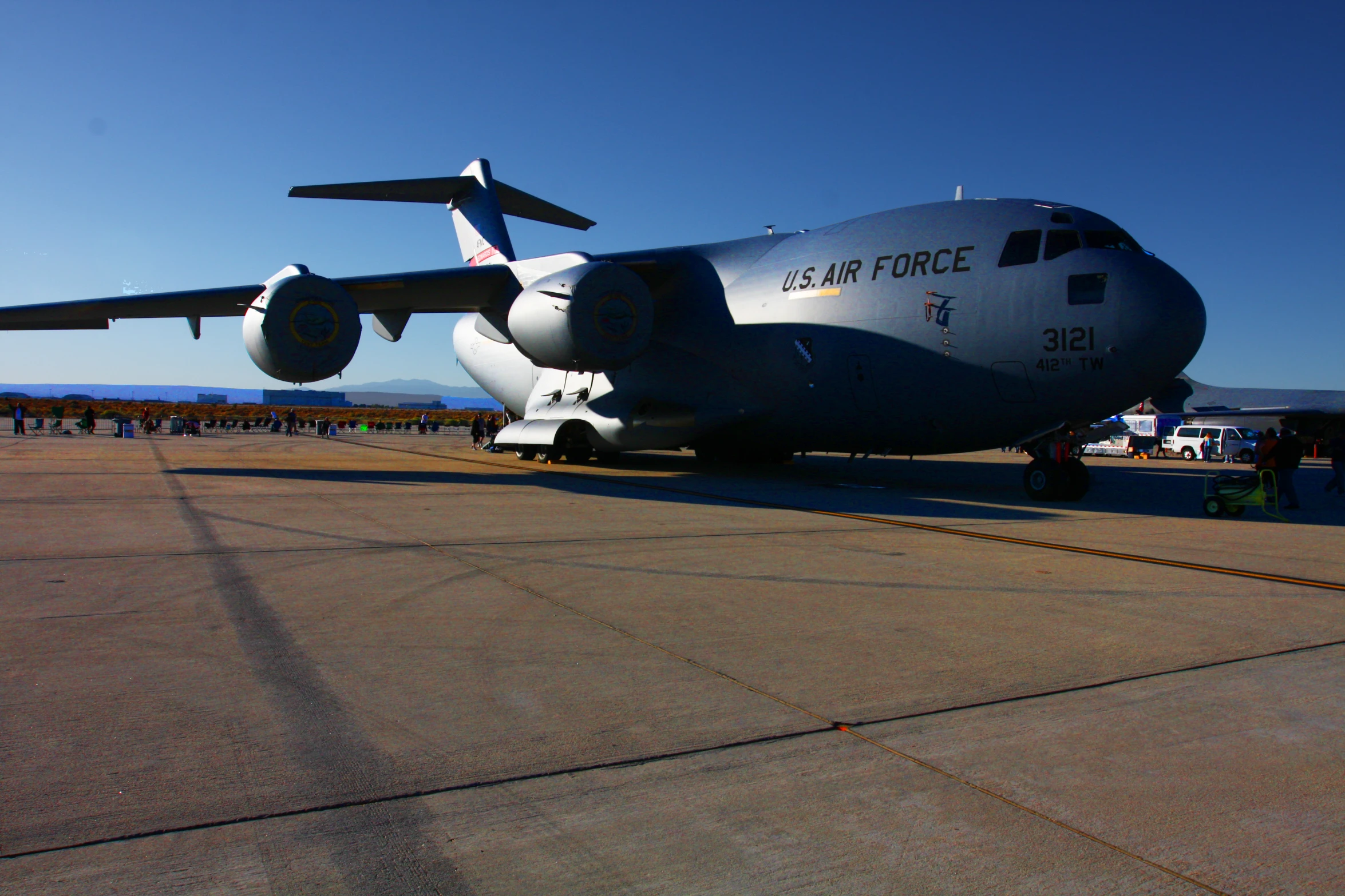 large cargo aircraft sitting on a runway waiting to take off