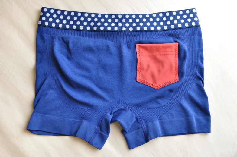 a pair of blue and red underwear with dots