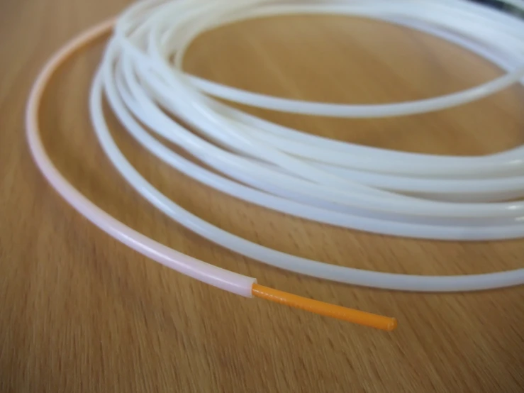 a plastic tube with some wires attached to it