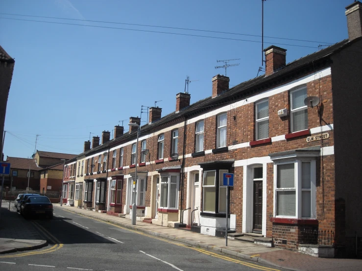 a row of buildings that is by some street