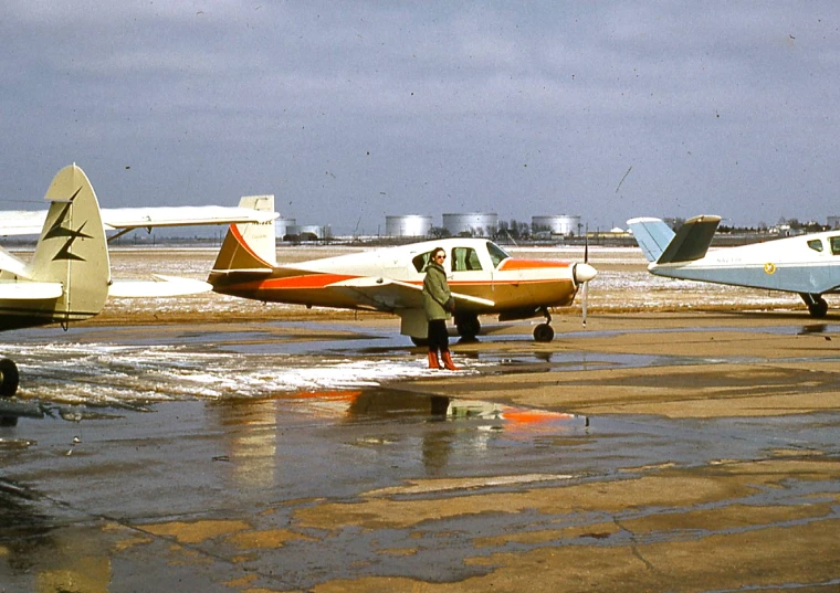 an airport with some planes parked in a row