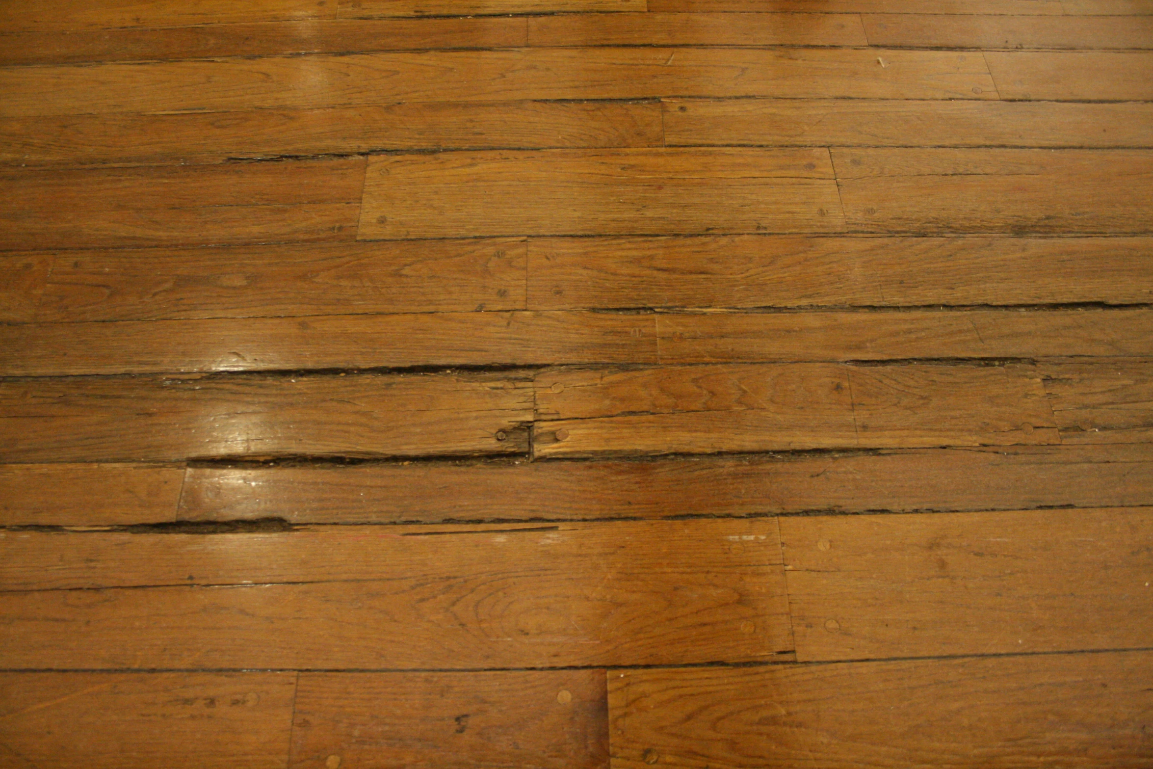 an image of an old wooden floor that is dirty