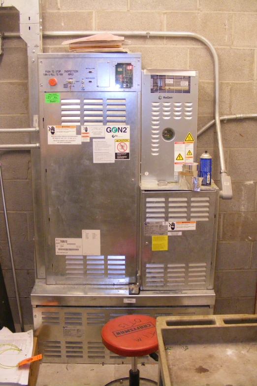 a machine sitting in a metal enclosure