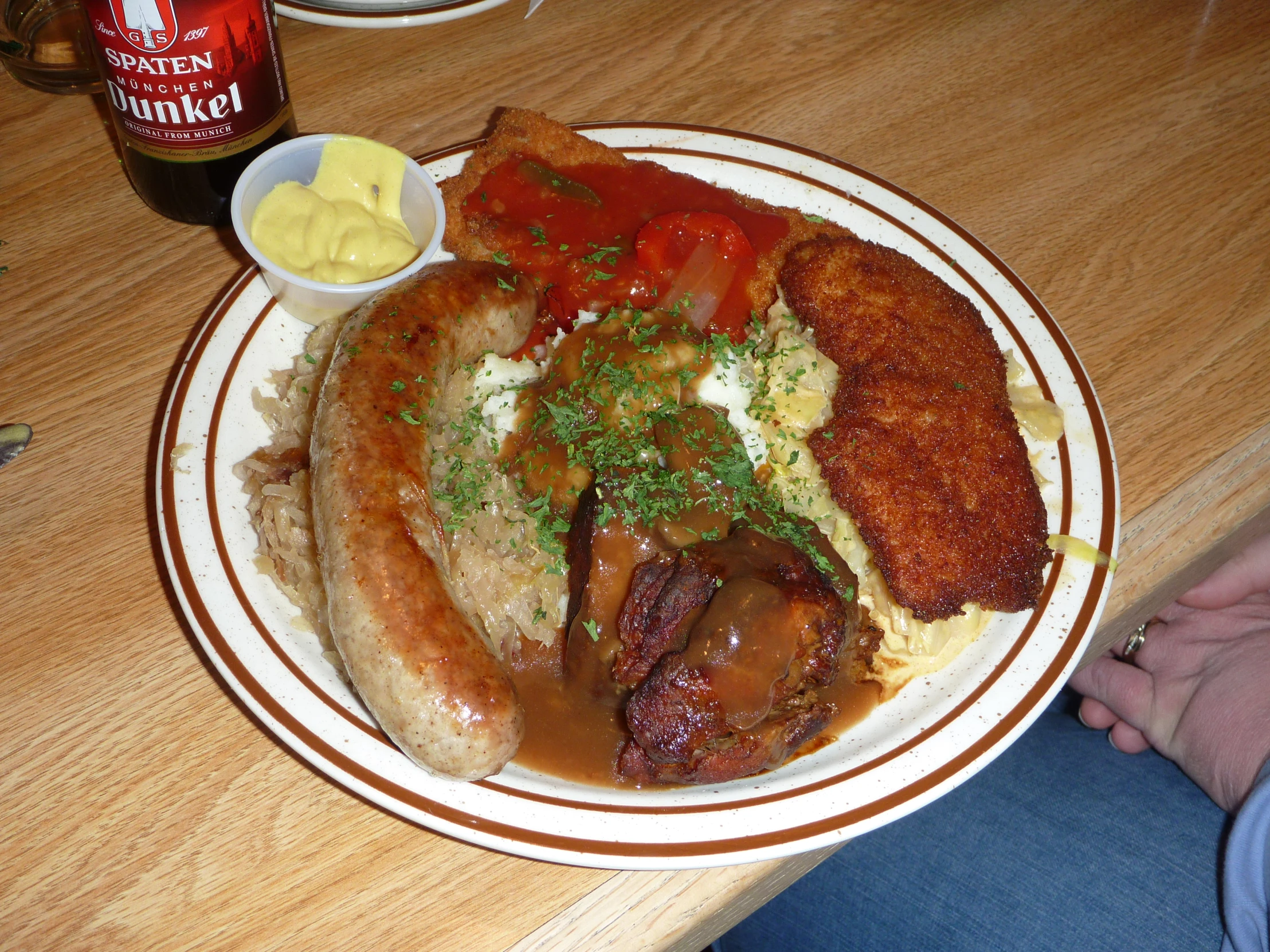 a white plate full of food on a table