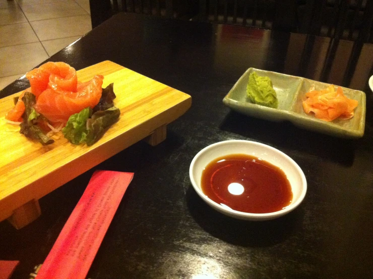 several plates of food are sitting on a table