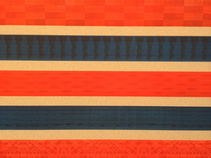 a large multi colored striped rug with stripes