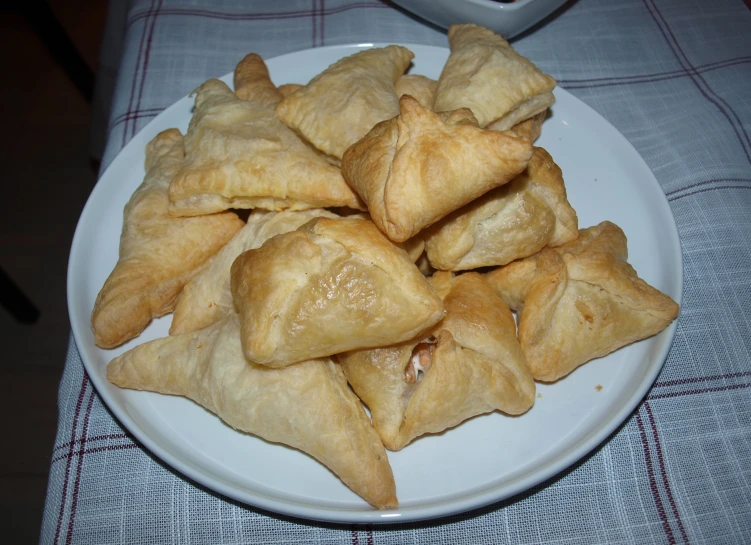 there is a plate with some tasty looking pasties