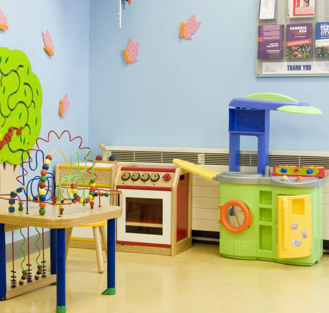 a 's room with toys in play areas