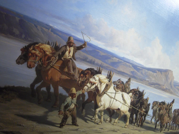 a man standing on a horse while being lead by two horses