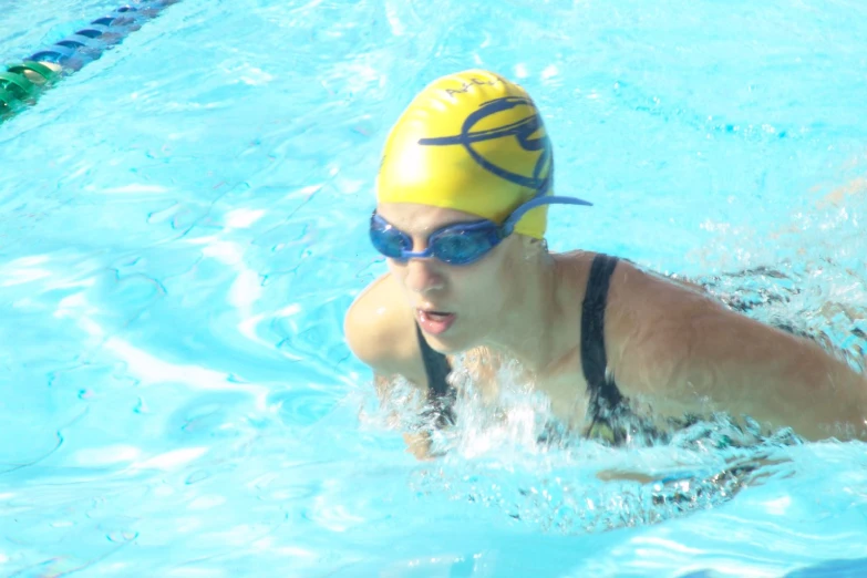 an image of a girl swimming in the water