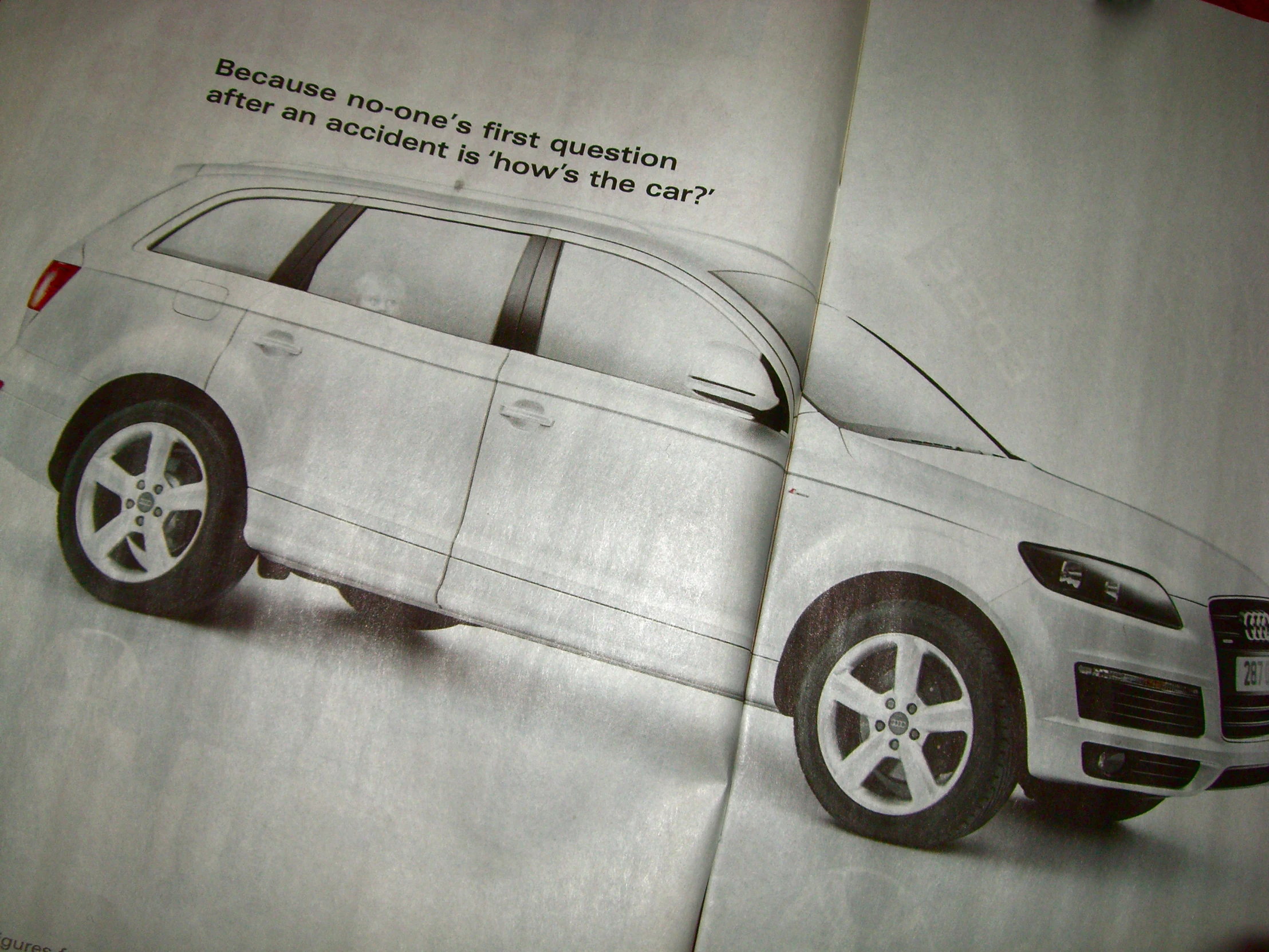 a magazine showing a car in front of a clock
