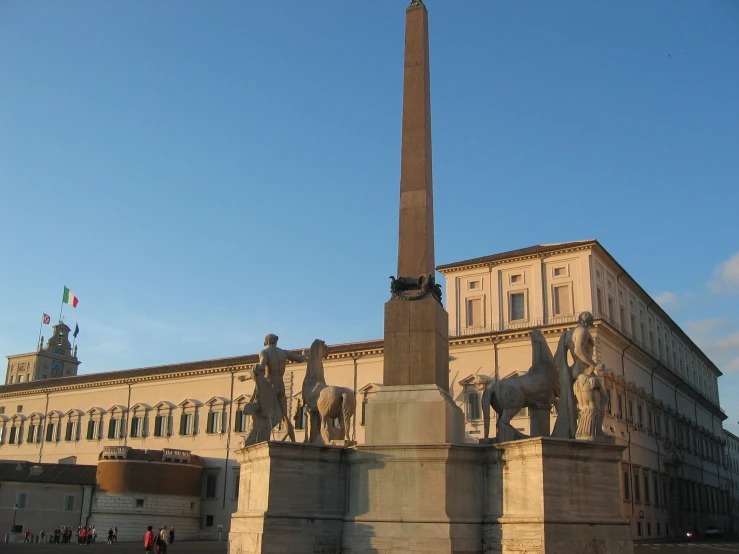 an obelisk on display in front of the building