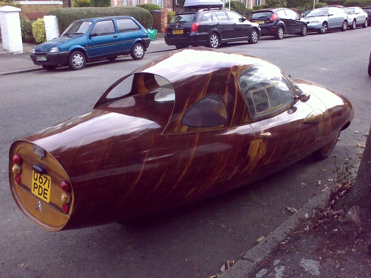 a car shaped like a futuristic vehicle on a street