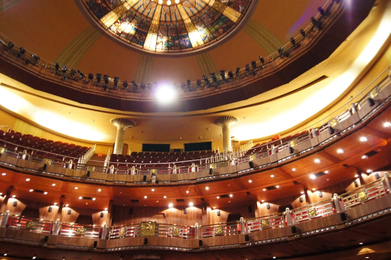 a very beautiful looking theatre with a big circular window