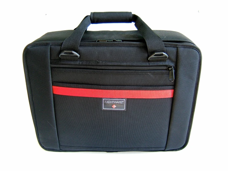 a blue briefcase with red and white straps