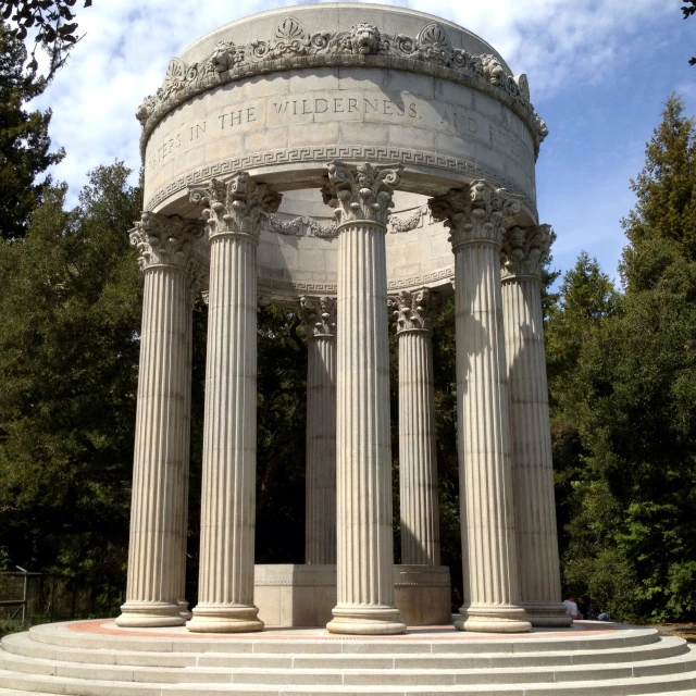 the large column and steps lead up to a fountain