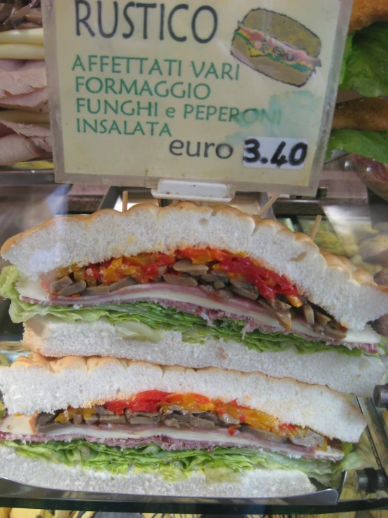 a display case filled with different types of sandwiches