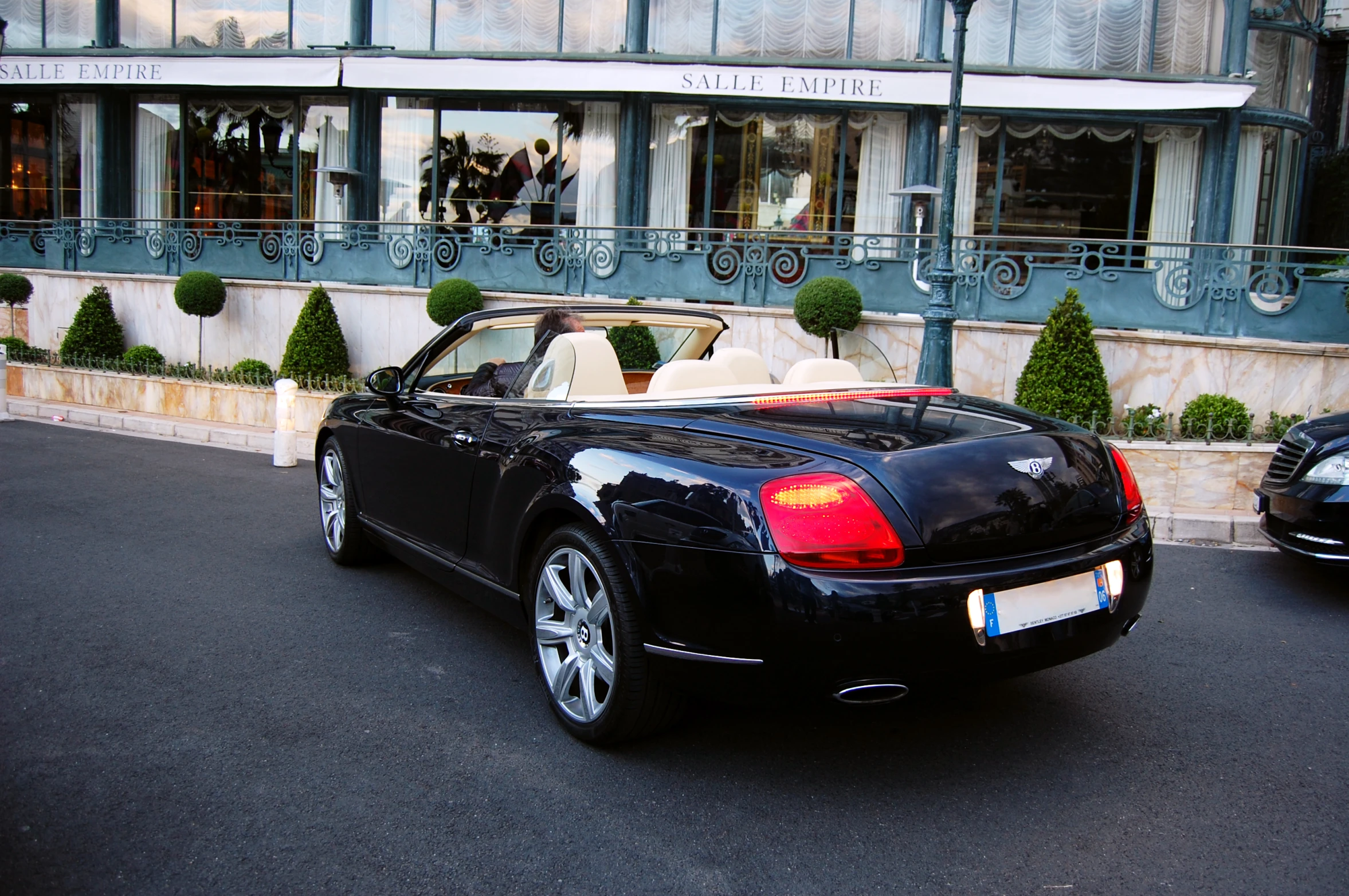 there is a bentley with the open top on