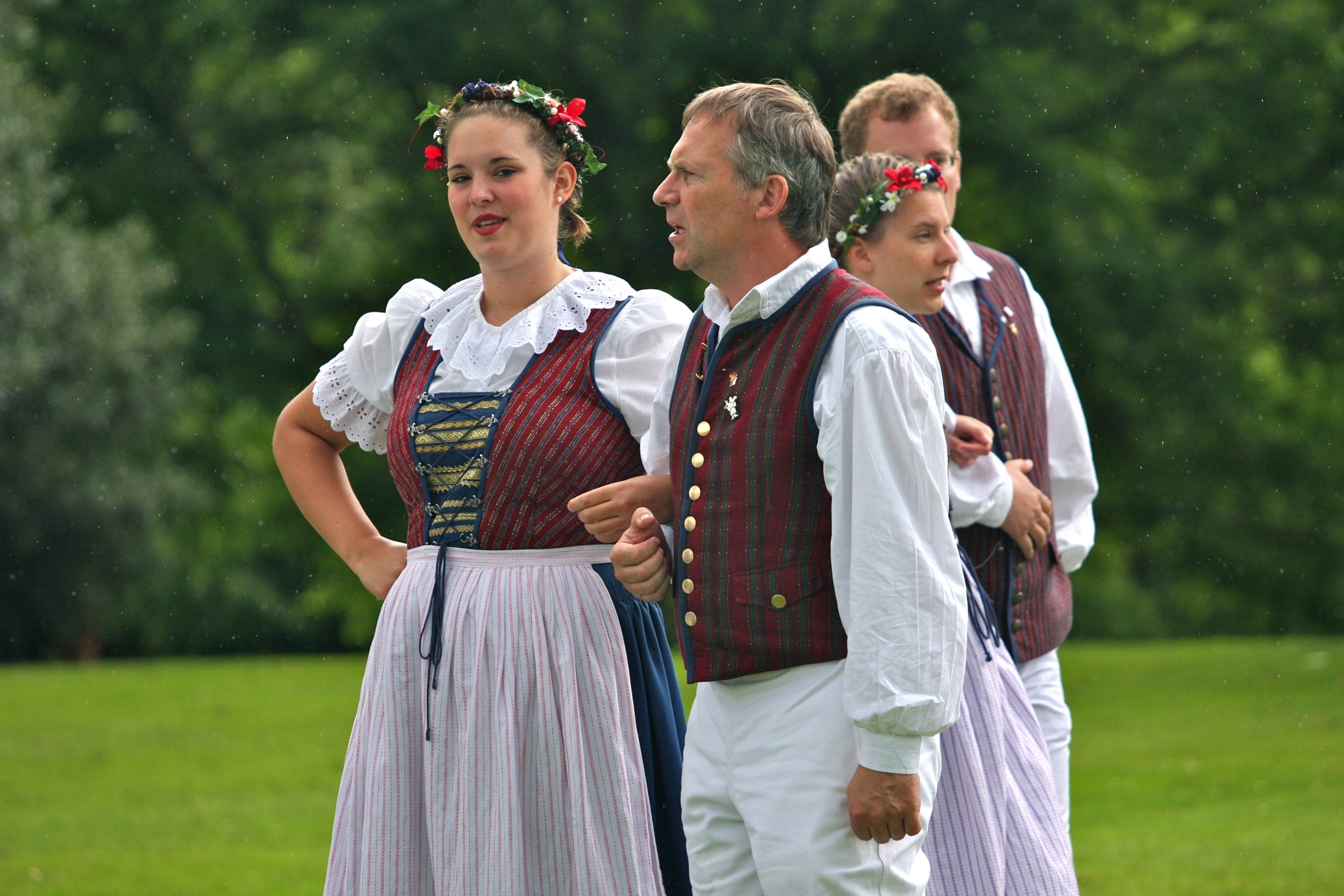 a man and women dressed in period dress