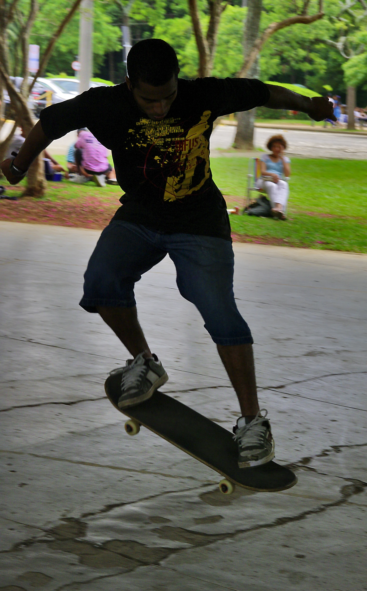 a man who is doing tricks on a skateboard